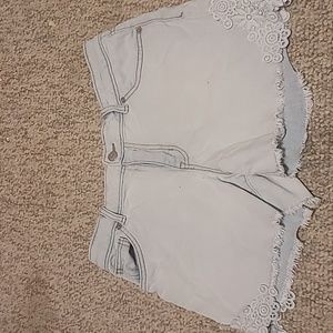 Cat & Jack shorts  14/16 light blue with white designs